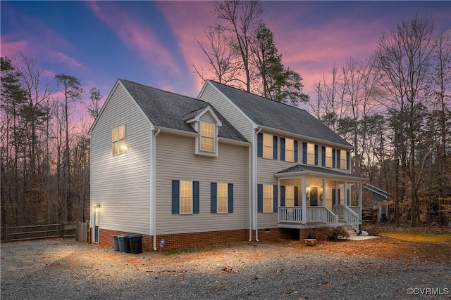 colonial inspired home with covered porch