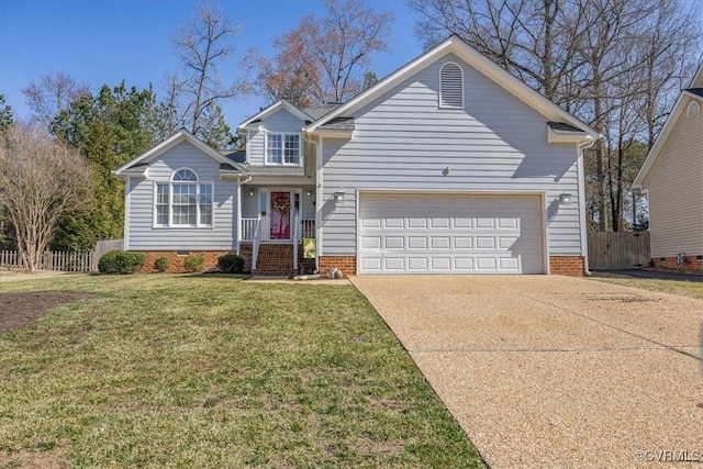 traditional home with a front lawn, fence, concrete driveway, crawl space, and an attached garage