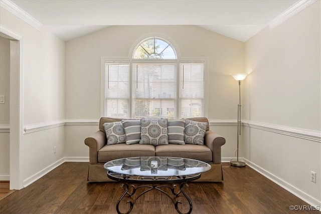 sitting room featuring plenty of natural light, lofted ceiling, and wood finished floors