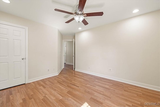 unfurnished room featuring recessed lighting, light wood-type flooring, baseboards, and ceiling fan