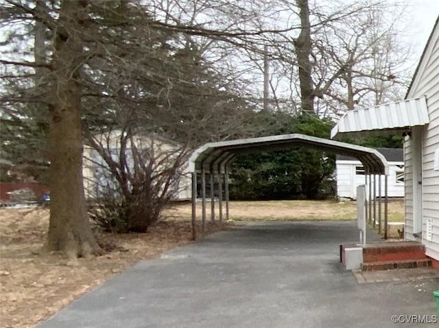 view of car parking featuring a carport