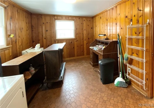 misc room featuring washer / clothes dryer and wood walls