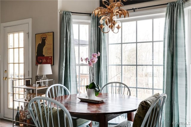 dining area featuring a chandelier