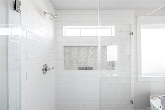 bathroom featuring walk in shower