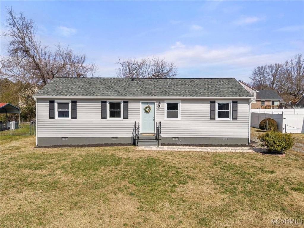 view of front of home with a front yard