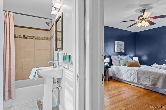 bedroom with wood finished floors