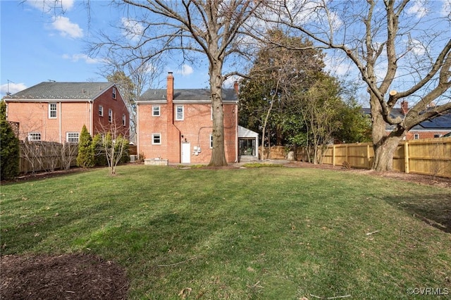 view of yard featuring a fenced backyard