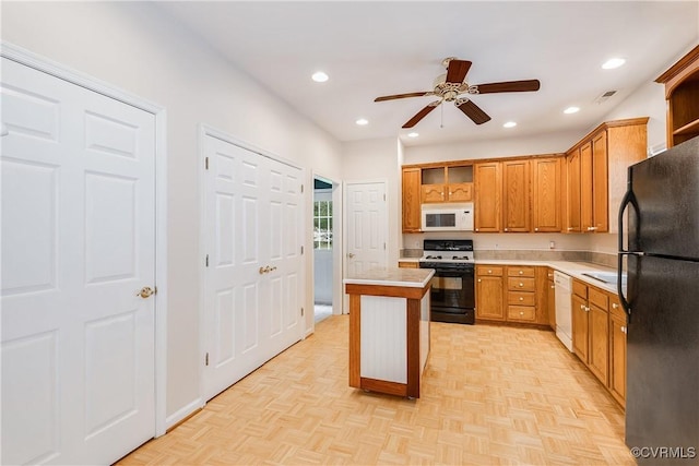 kitchen featuring a center island, brown cabinets, light countertops, open shelves, and white appliances