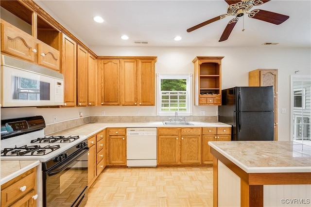 kitchen with visible vents, a sink, light countertops, open shelves, and white appliances