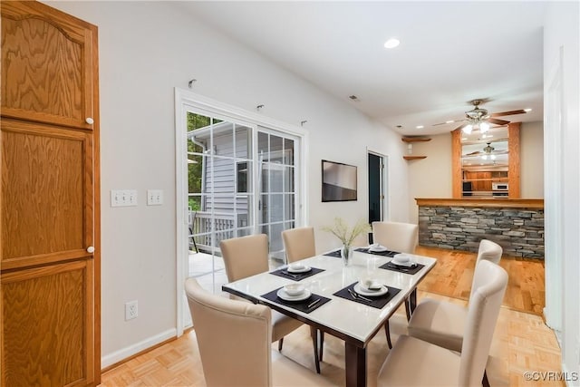 dining space with ceiling fan, baseboards, and recessed lighting