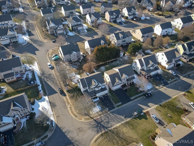 birds eye view of property with a residential view