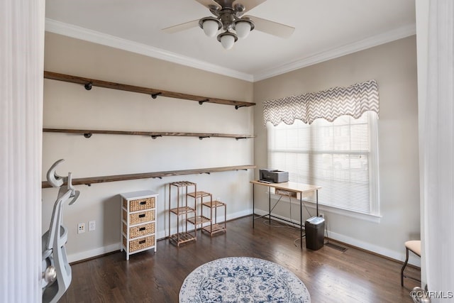 office area with ornamental molding, dark wood-type flooring, a ceiling fan, and baseboards