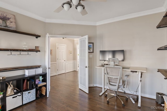 office with dark wood-style floors, a ceiling fan, crown molding, and a wainscoted wall