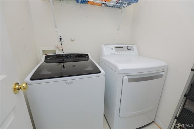 laundry room with laundry area and separate washer and dryer