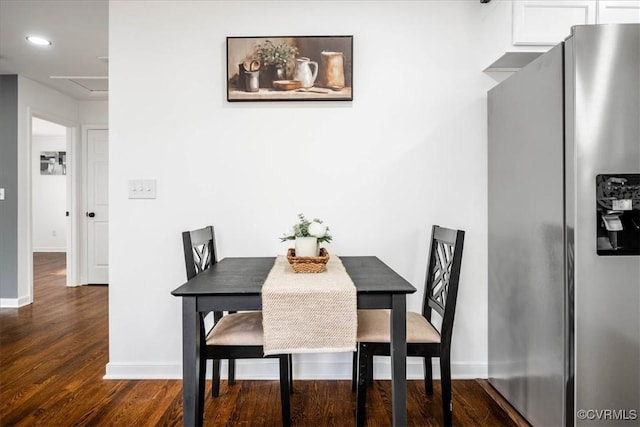 dining area featuring baseboards, dark wood-style flooring, and recessed lighting