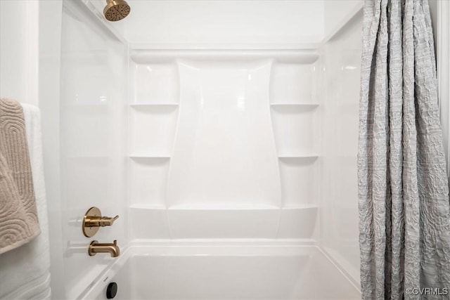 full bathroom with shower / tub combo