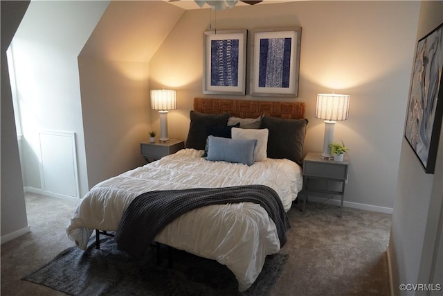 carpeted bedroom featuring baseboards