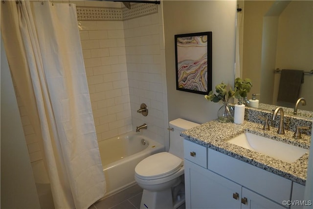 full bath featuring toilet, tile patterned flooring, shower / bath combo with shower curtain, and vanity