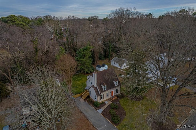 aerial view with a wooded view