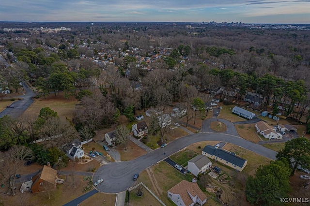 aerial view at dusk with a residential view