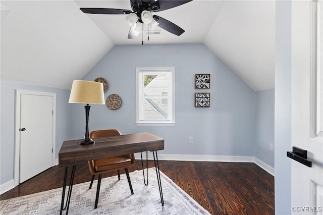 office area featuring lofted ceiling, baseboards, and wood finished floors