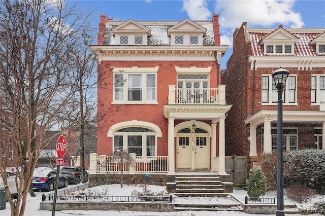 view of front of property featuring brick siding