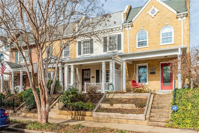 view of front of house with brick siding