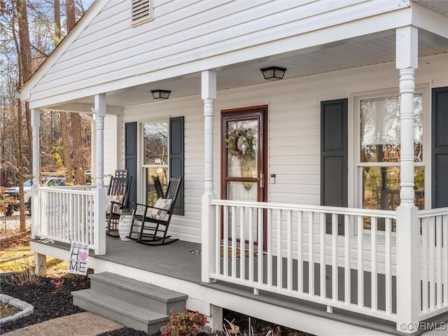 entrance to property with a porch