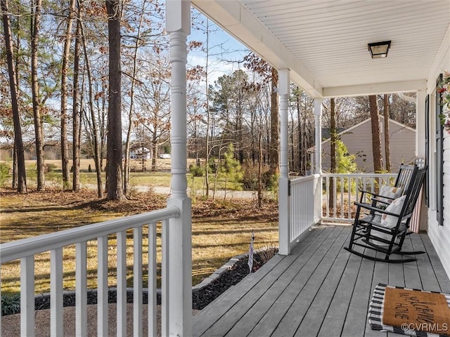 wooden deck featuring a porch