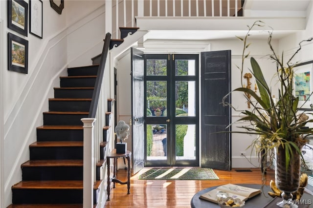 foyer with wood finished floors