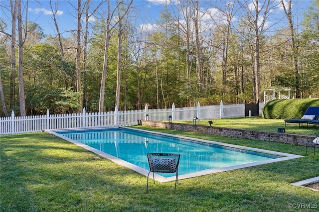 view of swimming pool with a yard, a fenced backyard, and a fenced in pool