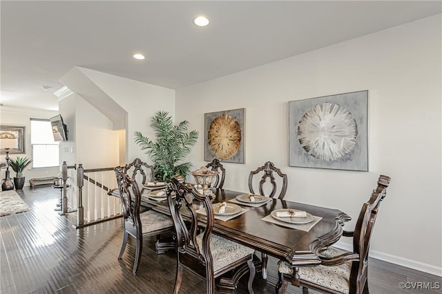 dining area featuring recessed lighting, baseboards, and wood finished floors