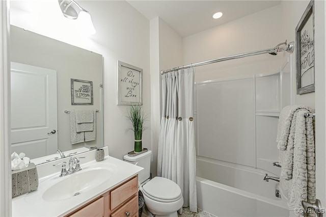 full bath featuring toilet, shower / bath combo, vanity, and recessed lighting