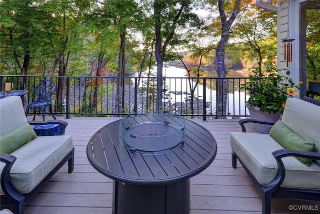 wooden terrace featuring an outdoor hangout area