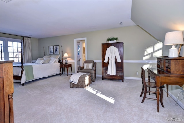 bedroom with carpet flooring and baseboards