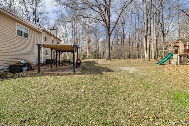 view of yard featuring a playground