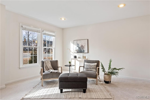 sitting room with recessed lighting, carpet flooring, and baseboards