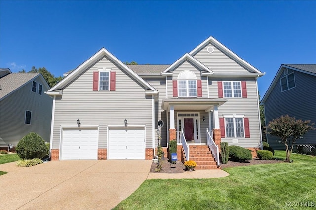 traditional home with a front lawn, concrete driveway, and an attached garage