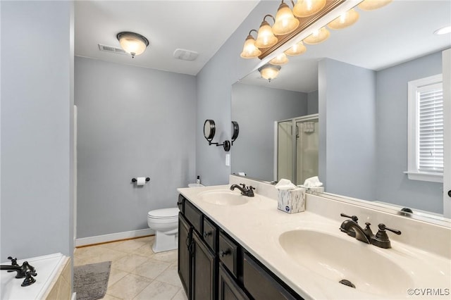 bathroom featuring visible vents, a stall shower, toilet, and a sink