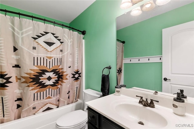 bathroom featuring vanity, toilet, and shower / bath combo