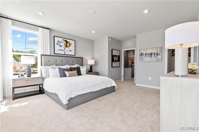 bedroom featuring recessed lighting, visible vents, light carpet, and baseboards