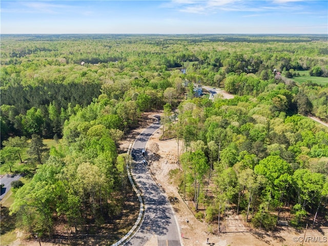 bird's eye view featuring a forest view