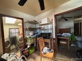 miscellaneous room with ceiling fan and separate washer and dryer