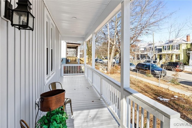 balcony with a porch and a residential view