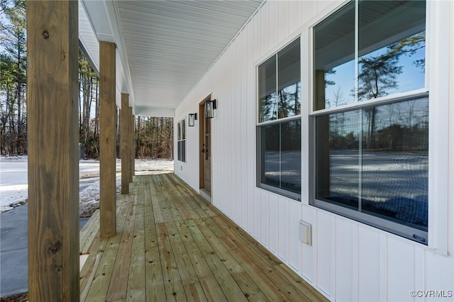 wooden deck featuring covered porch