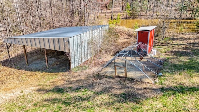 view of outdoor structure featuring a carport