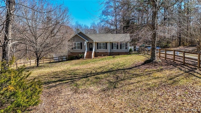 single story home with crawl space, a front yard, and a fenced backyard