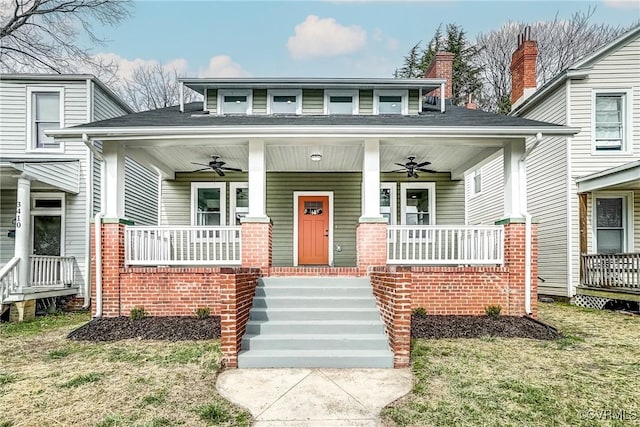 view of front of house with a porch and ceiling fan