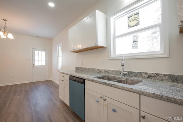 kitchen featuring dark wood finished floors, dishwashing machine, light stone countertops, white cabinetry, and a sink