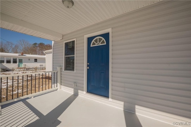 doorway to property featuring a balcony